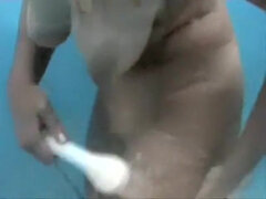 Pretty lady demonstrates her trimmed vagina underwater