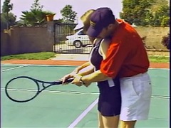 Lustful brunette gets excited after a tennis match and fucks with a stud on the court