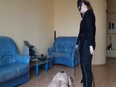 Monica instructs her pet during an intense female domination session