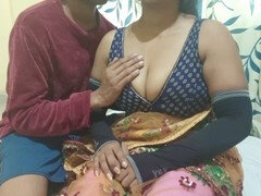 Seductive Indian Bhabhi heats up in traditional attire for some steamy sex