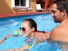 Young brunette babe gets banged by her swimming instructor