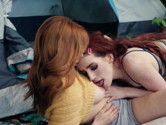 Excited girlfriends with red hair have lesbian sex by their tent