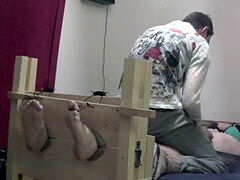 man all strapped up and tickled in Stocks