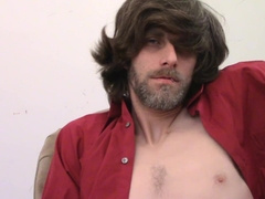 Draped heterosexual boy preps to finish off a ample stream