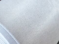 Teasing wearing layered shiny pantyhose and white nylons