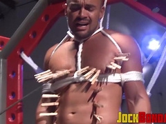 Dire Calalhan increases the agony of Jessie by smashing the pins with a baton