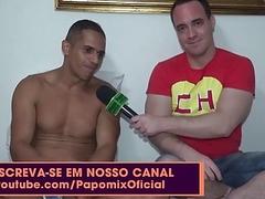 Latino stud interviewed before a live sex show