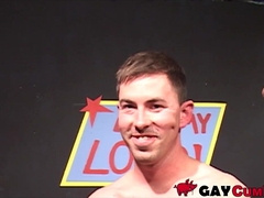 Handsome guys gets on their knees and suck cocks behind a cover