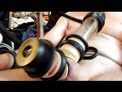 Machine milking my Cock and Balls in separate tubes! Lovebotz Miller using smaller rubber bands on ends.