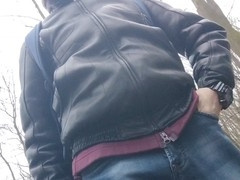 Handsome man explores gay fetish pleasures in the forest