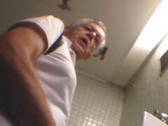 Voyeur films old males in the public restroom