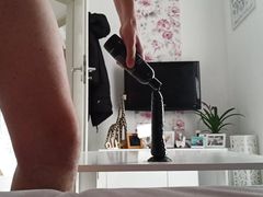 Anal dildo fuck on the table with cum