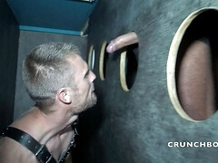 A gay is sucking XXL blakc cock in gloryholes