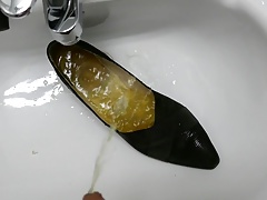 Piss in co-workers high heel