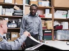 A security guard fucks his colleague to keep him quite