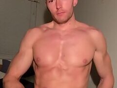 hot guy jerks off and cums on his abs and eats cum
