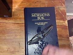 Cum on old pair of glasses and Mormon Book.
