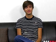 Handsome twink has fun at an interview before jerking off