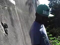 the boy with the bbc jerks off in the garden