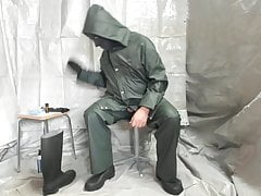 Wanking in Green Coat and Mask