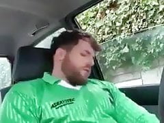 bear cub shooting a hot load on his sports kit in the car