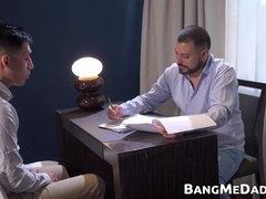 Petite twink Alejo gets on his knees to devour daddy Daniels cock