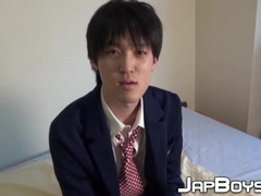 Japanese twink pulls his throbbing dick out to masturbate