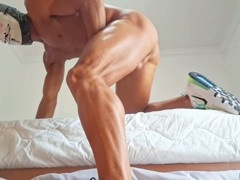 Hot guy with a big cock having solo fun with a fake ass in bed - moaning and unloading inside