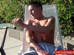 Smoker twink Ryan plays with his ass while stroking his cock