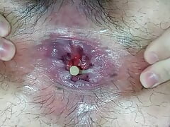 Closeup up anal masturbation with water bottle