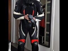 Guy in Dainese Bora leather suit and S10 gas mask shoots his load with vibrator