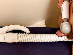 Hand Massager Vibrator Pressing A Small Penis On A Vacuum Cleaner Hose And Cumming On It