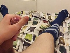 Stroking in football socks