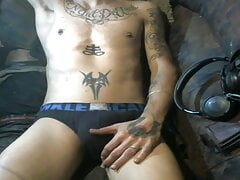 Tattooed Hunk with abs teases Nd shows off his sounding skil