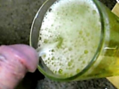 Flexible jock pees in a glass and sucks himself off