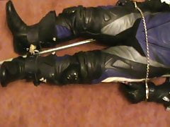 Shackled bikerslave is restrained