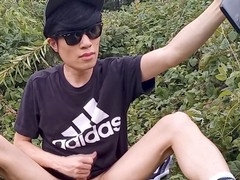 Jon Arteen, an adventurous Asian twink, rocks an Adidas tee, casual pants, white socks and kicks