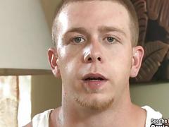 A Fleshlight engulfs this tattooed guy's big boner