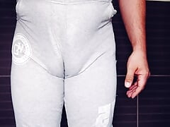 Chubby man pissing in pants and masturbating