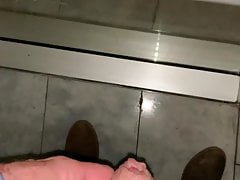 piss against window in public
