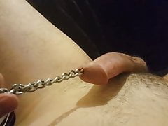 Guy pulling chain out his urethra