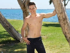 Fit hottie Kace jerks his ginormous white cock