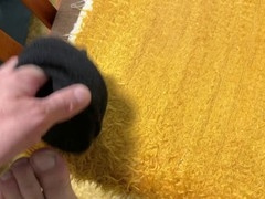 Earl Smile shows off his old, worn-out socks in a funny solo skit