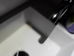 Pissing in a sink