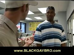 Horny white queer sucks a big black dick in a store
