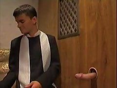 priest - in confessional and two altar boys