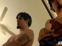 Inked youngster ejaculates on his glass of soda and swallows it