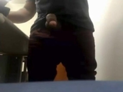 Brazilian Daddy Strokes His Big Uncut Cock at Work