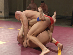 Muscular men use their huge dicks to wrestle in a kinky play