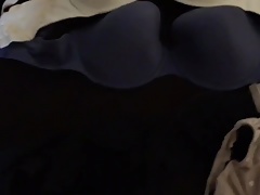 Jacking off on pile of wife's bras